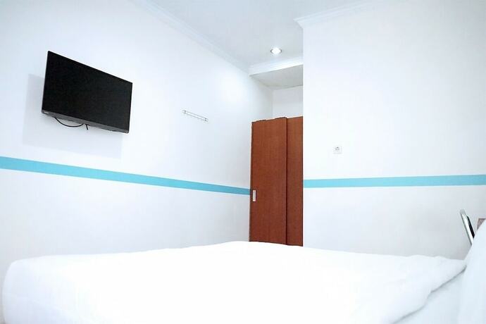 Imagen de la habitación del Hotel Kost Syailendra by Ruang Nyaman. Foto 10