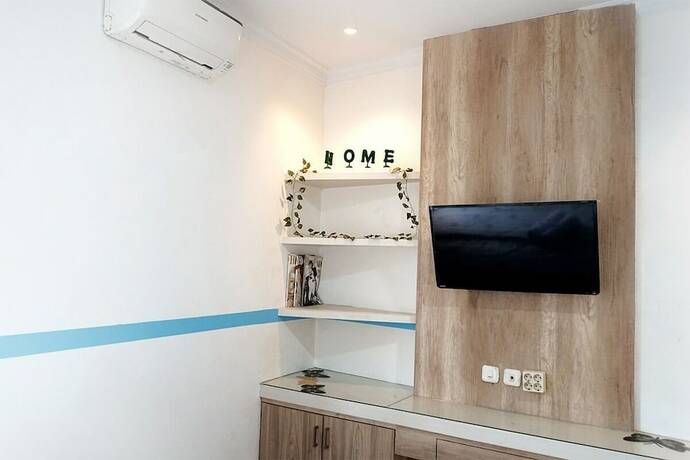 Imagen de la habitación del Hotel Kost Syailendra by Ruang Nyaman. Foto 13