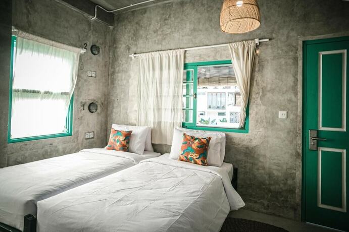 Imagen de la habitación del Hotel Kosta House Canggu. Foto 19