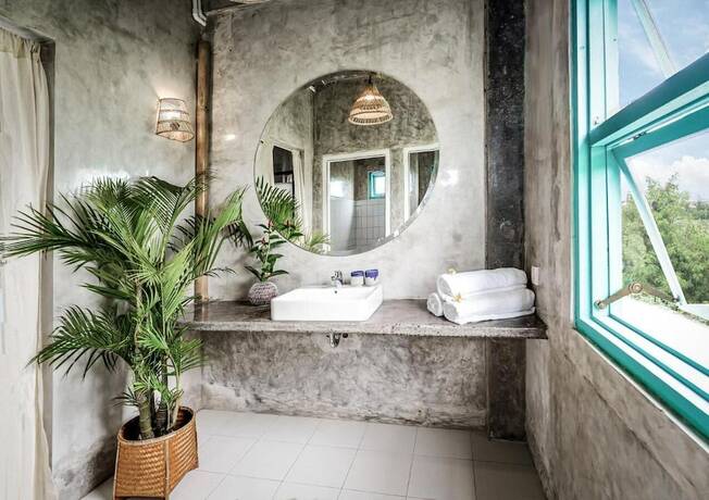 Imagen de la habitación del Hotel Kosta House Canggu. Foto 20