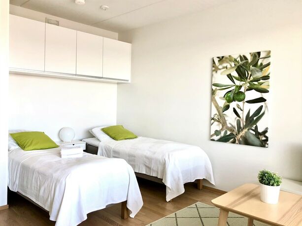 Imagen de la habitación del Hotel Kotimaailma Apartments Tampere. Foto 19