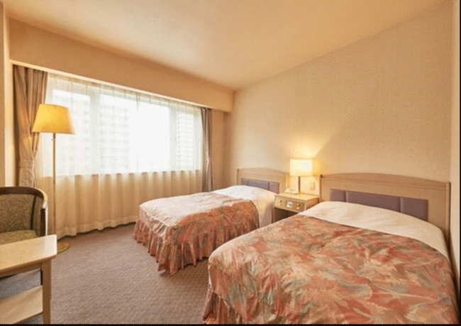 Imagen de la habitación del Hotel Kotoni Green. Foto 17