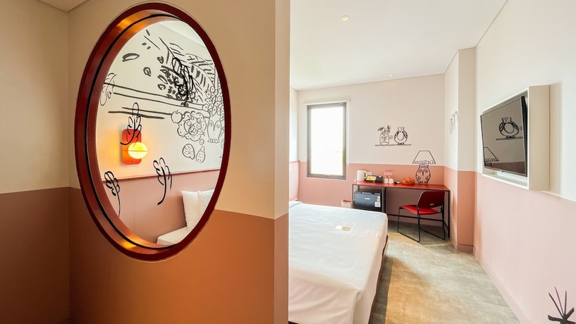 Imagen de la habitación del Hotel Kotta GO Tegal. Foto 6