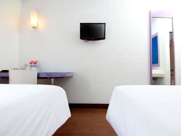 Imagen de la habitación del Hotel Kotta Go Yogyakarta. Foto 7