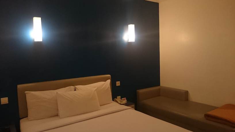 Imagen de la habitación del Hotel Kotta Go Yogyakarta. Foto 11