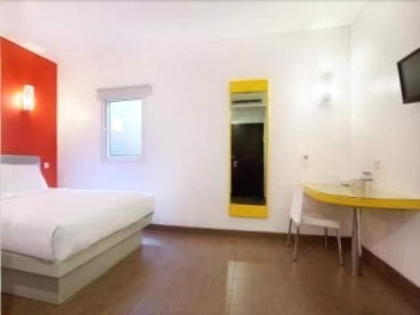 Imagen de la habitación del Hotel Kotta Go Yogyakarta. Foto 12