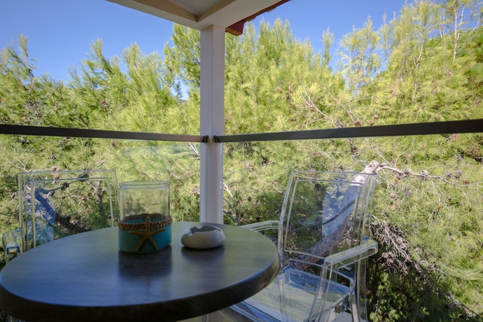 Imagen de la habitación del Hotel Koukounaria and Suites. Foto 15