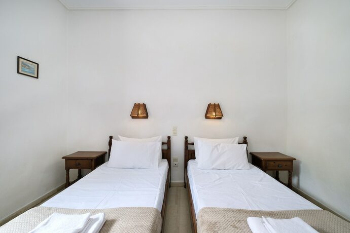 Imagen de la habitación del Hotel Koukounaries Beach. Foto 16