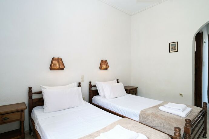 Imagen de la habitación del Hotel Koukounaries Beach. Foto 18