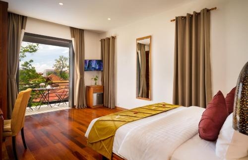 Imagen de la habitación del Hotel Koulen. Foto 9