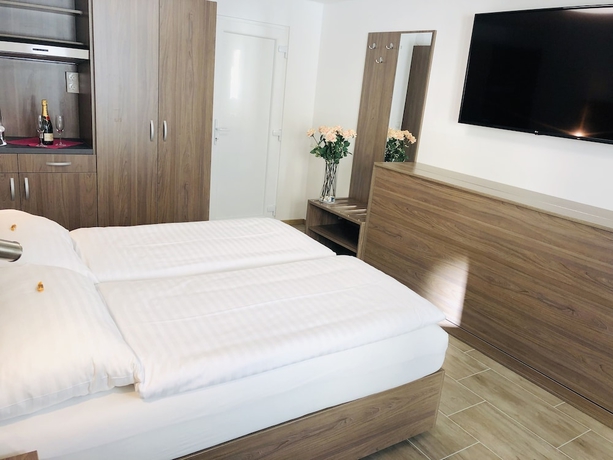 Imagen de la habitación del Hotel König, Simmering. Foto 8