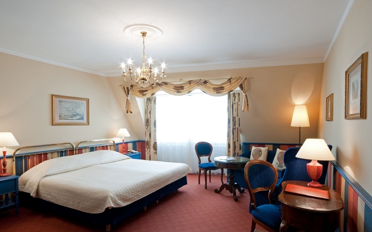 Imagen de la habitación del Hotel König Von Ungarn. Foto 10