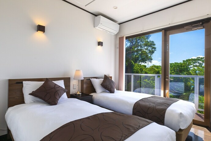 Imagen de la habitación del Hotel Kouri Ocean Moon Cottage. Foto 27