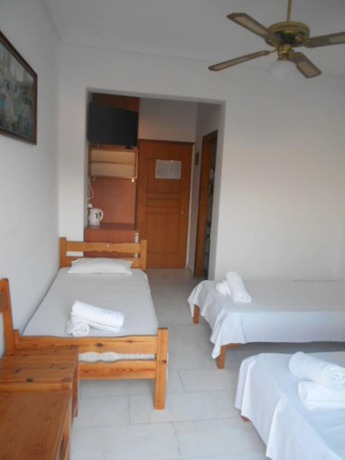 Imagen de la habitación del Hotel Kourkoumelata. Foto 11