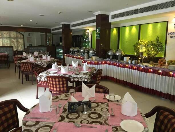 Imagen del bar/restaurante del Hotel Kovilakam Residency Private Limited. Foto 14