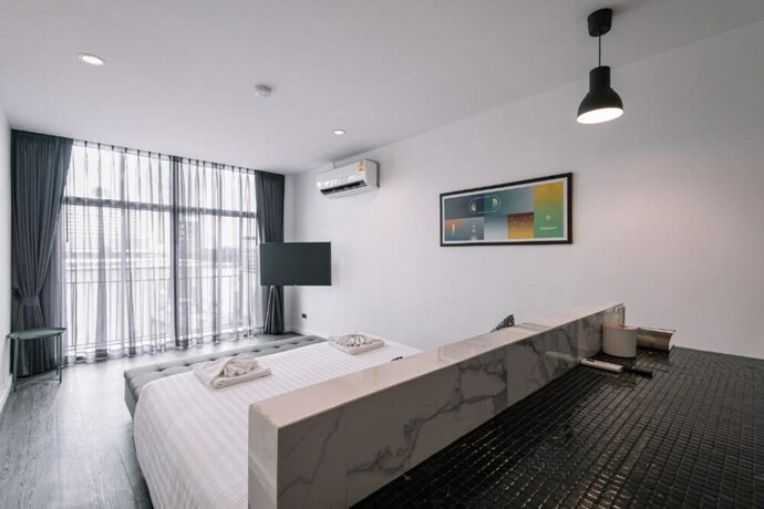 Imagen de la habitación del Hotel Kowtha Rivertel. Foto 6