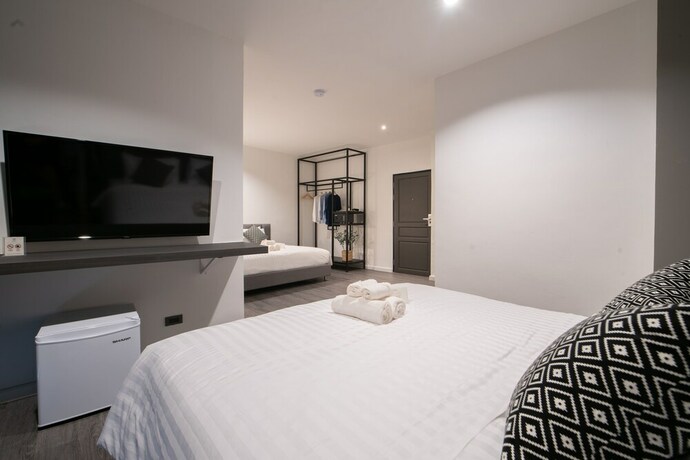Imagen de la habitación del Hotel Kowtha Rivertel. Foto 9