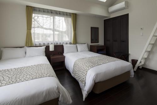 Imagen de la habitación del Hotel Koyaru-no-sato Doggys Island. Foto 8