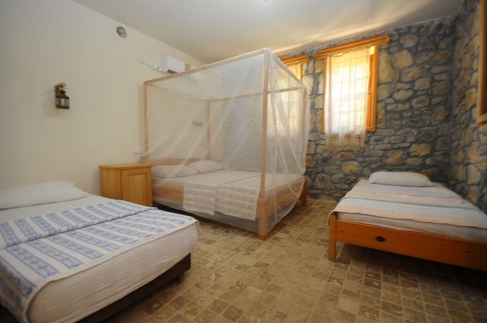 Imagen de la habitación del Hotel Koyevi Olympos Countryhouse. Foto 2