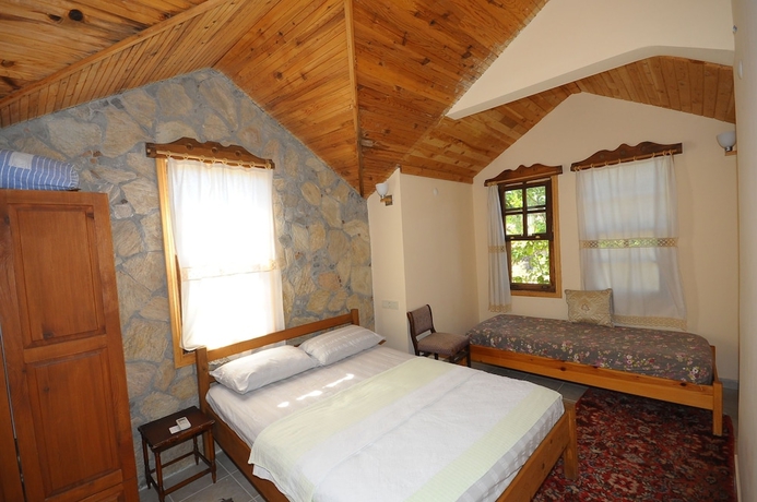 Imagen de la habitación del Hotel Koyevi Olympos Countryhouse. Foto 5