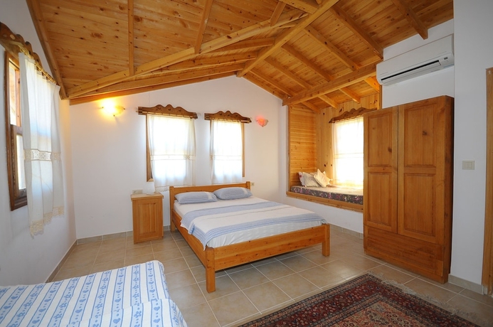 Imagen de la habitación del Hotel Koyevi Olympos Countryhouse. Foto 6