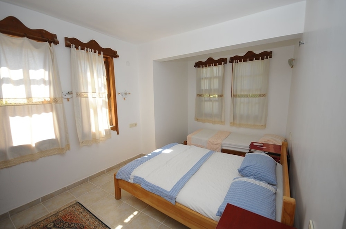 Imagen de la habitación del Hotel Koyevi Olympos Countryhouse. Foto 7