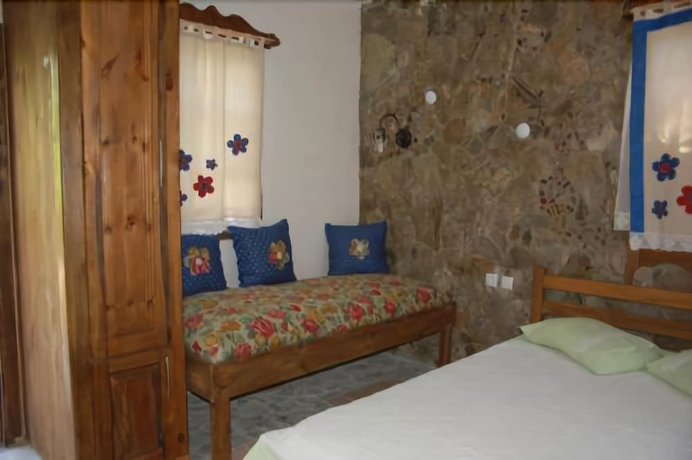 Imagen de la habitación del Hotel Koyevi Olympos Countryhouse. Foto 9