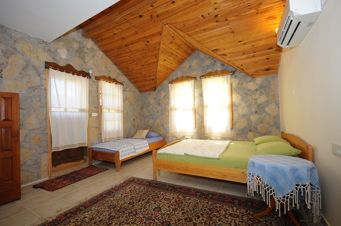 Imagen de la habitación del Hotel Koyevi Olympos Countryhouse. Foto 13