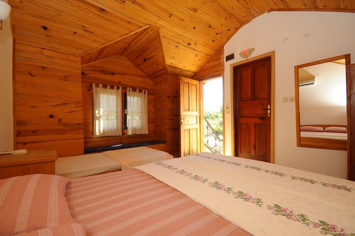 Imagen de la habitación del Hotel Koyevi Olympos Countryhouse. Foto 15