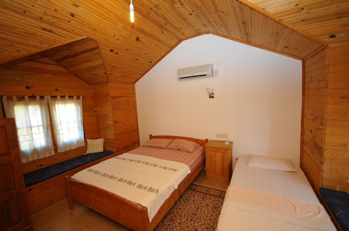 Imagen de la habitación del Hotel Koyevi Olympos Countryhouse. Foto 16