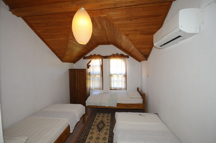 Imagen de la habitación del Hotel Koyevi Olympos Countryhouse. Foto 19