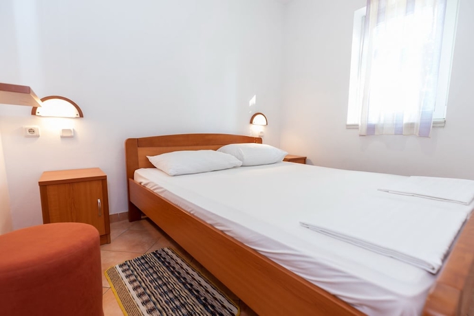 Imagen de la habitación del Hotel Kozarica Apartments. Foto 4