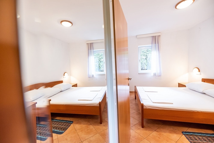 Imagen de la habitación del Hotel Kozarica Apartments. Foto 6