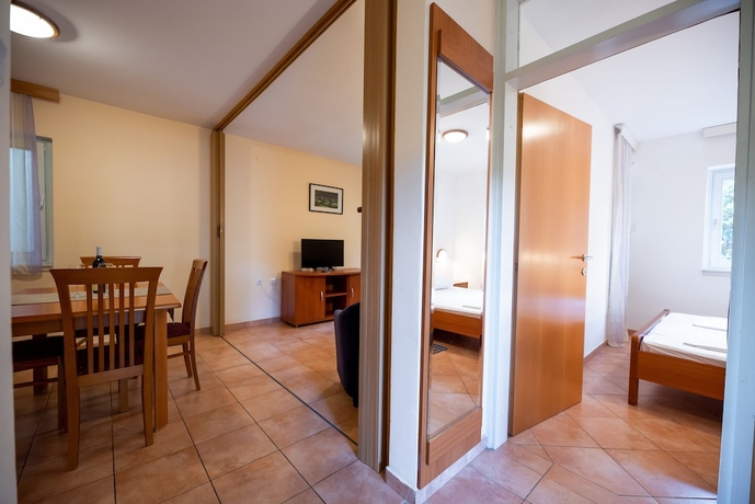 Imagen de la habitación del Hotel Kozarica Apartments. Foto 7