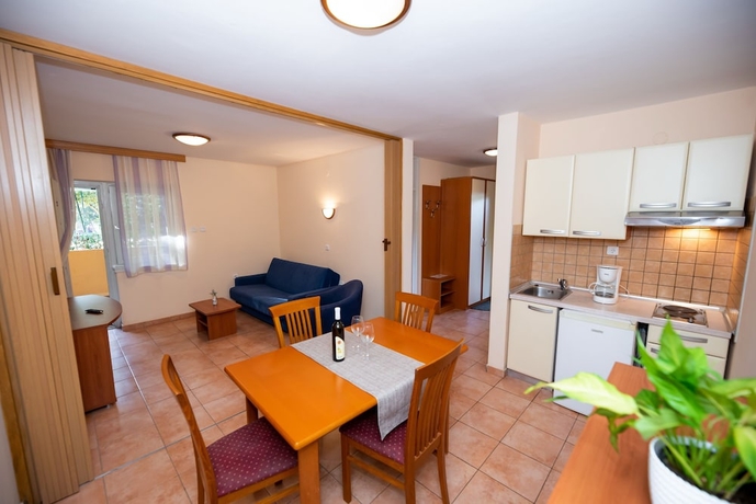 Imagen de la habitación del Hotel Kozarica Apartments. Foto 8