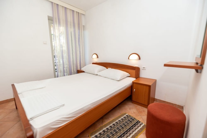 Imagen de la habitación del Hotel Kozarica Apartments. Foto 10