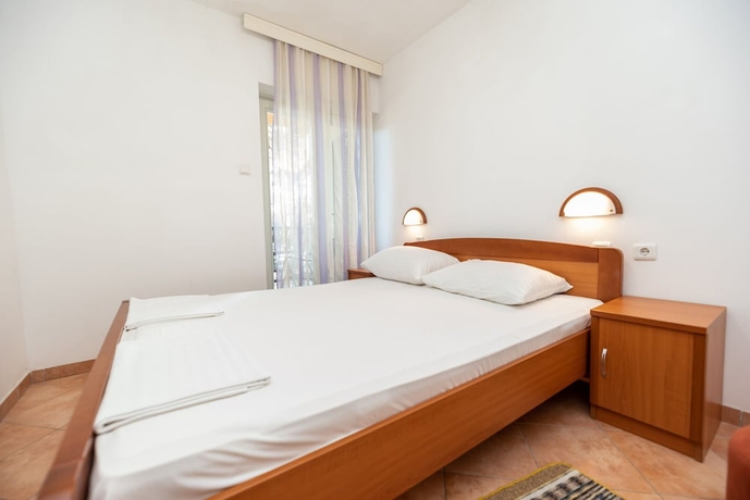 Imagen de la habitación del Hotel Kozarica Apartments. Foto 11