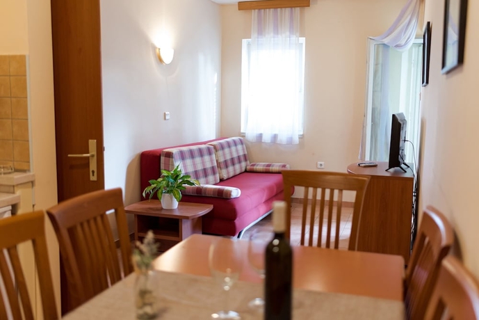 Imagen de la habitación del Hotel Kozarica Apartments. Foto 12