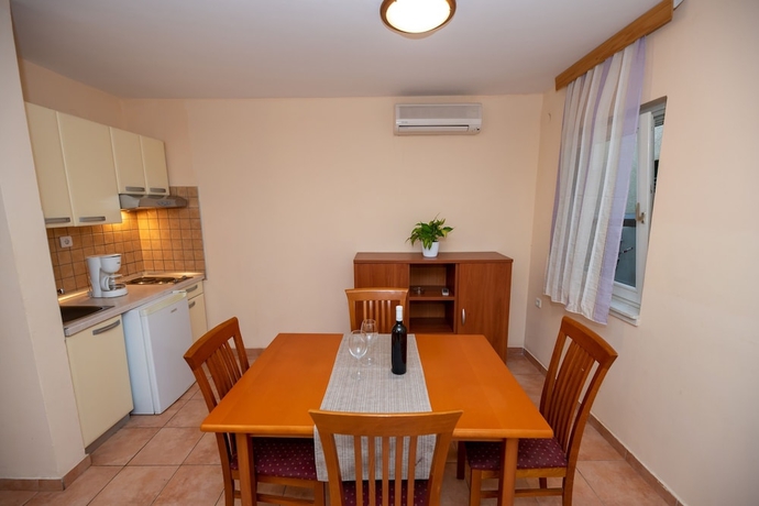 Imagen de la habitación del Hotel Kozarica Apartments. Foto 13