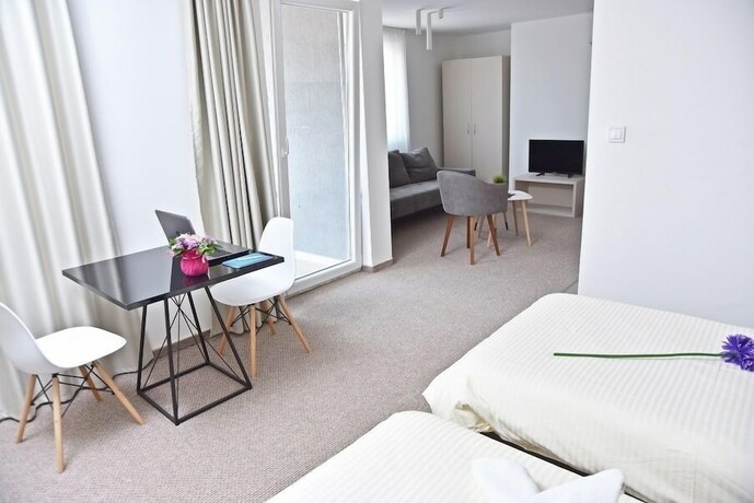 Imagen de la habitación del Hotel Kozle City Apartments. Foto 17