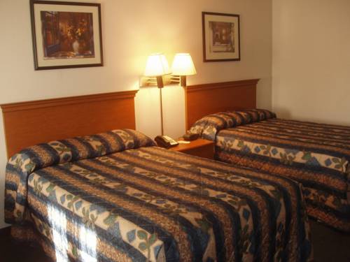 Imagen de la habitación del Hotel Kozy Inn. Foto 13