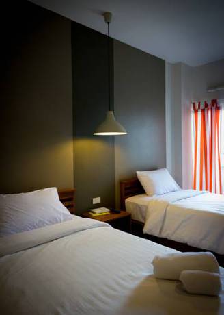 Imagen de la habitación del Hotel Krabi Pitta House. Foto 9