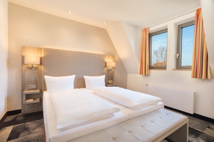 Imagen de la habitación del Hotel Kr&auml;merbr&uuml;cke Erfurt. Foto 13