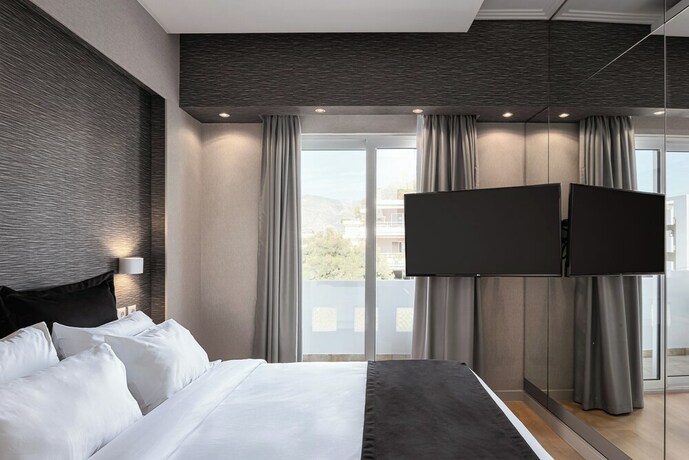 Imagen de la habitación del Hotel Kreoli Suites Glyfada. Foto 17