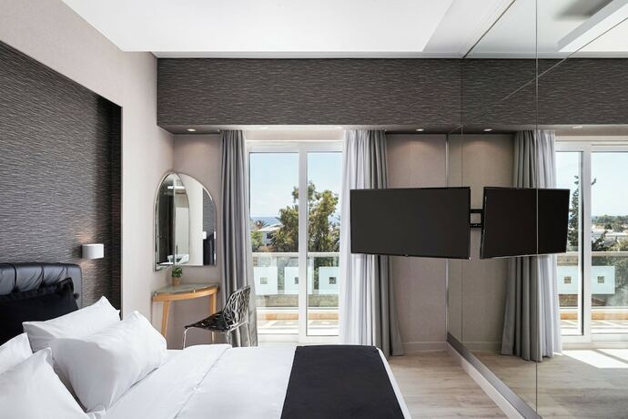 Imagen de la habitación del Hotel Kreoli Suites Glyfada. Foto 19