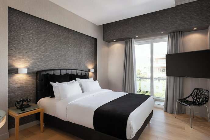 Imagen de la habitación del Hotel Kreoli Suites Glyfada. Foto 20
