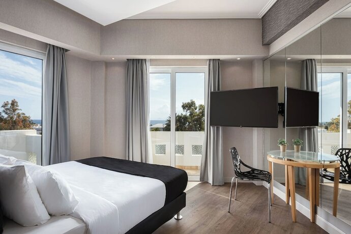 Imagen de la habitación del Hotel Kreoli Suites Glyfada. Foto 21