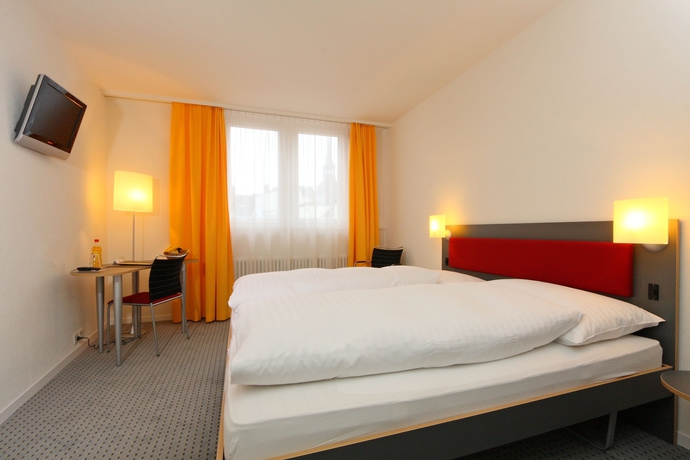 Imagen de la habitación del Hotel Kreuz Bern Modern City. Foto 5