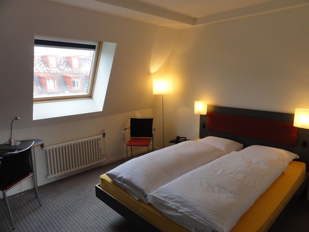 Imagen de la habitación del Hotel Kreuz Bern Modern City. Foto 7
