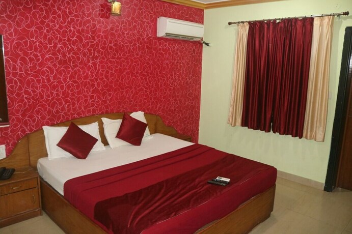Imagen de la habitación del Hotel Krish Holiday Inn. Foto 18